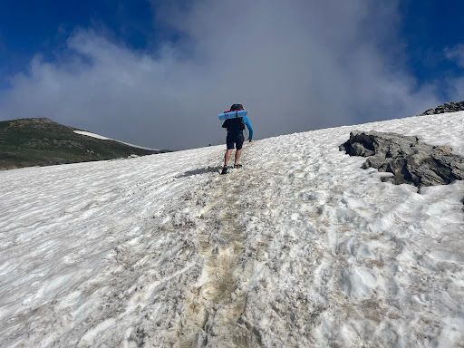 Sam is climbing higher on the mountain.